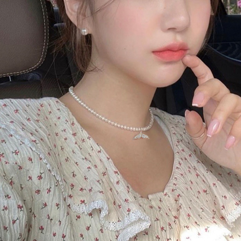 正圆强光baby小珍珠锁骨链鱼尾吊坠轻奢小众珍珠项链女款2026新款